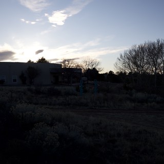 Dusk Silhouette Over Abandoned Desert Property