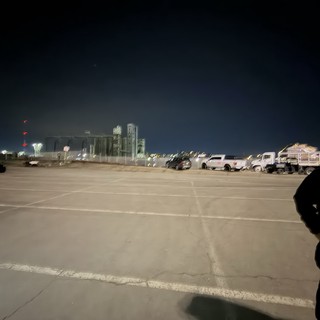Industrial Parking Lot at Dawn Before Concert