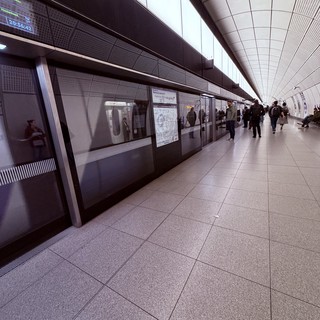 Modern London Underground Platform at Rush Hour