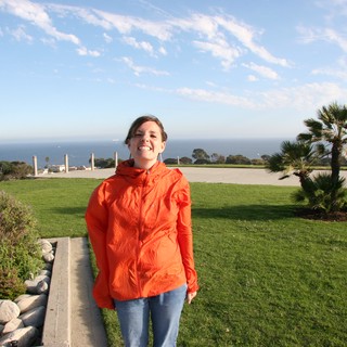 Woman Enjoying Coastal View at Scenic Overlook