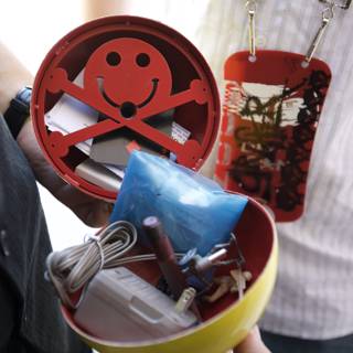 Smiling Man with Red Tin