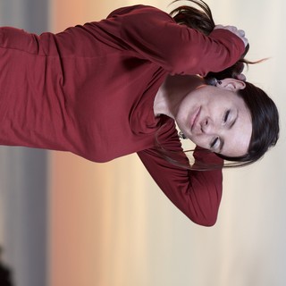 Windswept Woman at Golden Hour by the Sea