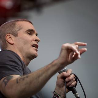 Henry Rollins Rocks Coachella with his Tattooed Mic-Holding Hand