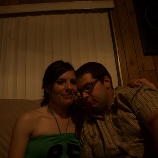 Couple Relaxing Together on Couch at Night
