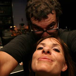 Playful Bar Moment Between Two Friends in 2005