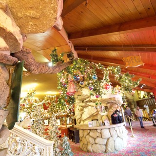 Festive Christmas Wonderland Inside Rustic Log Cabin Store