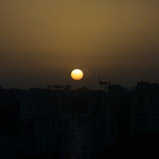 Setting Sun Behind Egyptian Metropolis