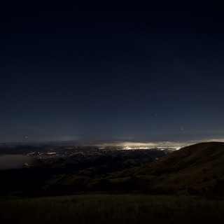 City Lights Glow Beneath Mount Diablo's Dark Ridgeline