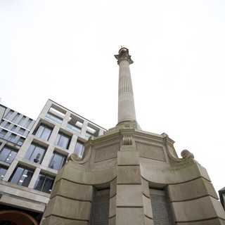 Classical Stone Column Monument in Urban London Setting