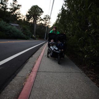 Evening Stroller Walk Along Suburban Sidewalk