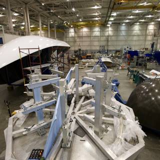 Manufacturing a Large White Object in a Hangar Factory