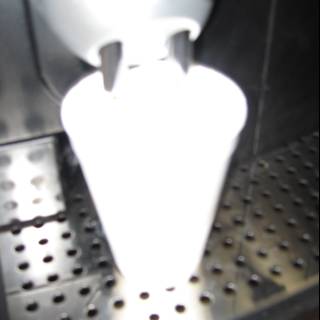 Coffee Pouring into Machine