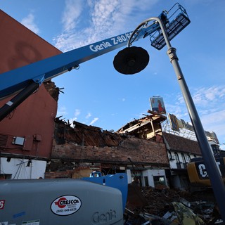 Demolition Site with Genie Crane at Dusk