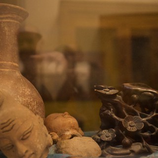 Tranquil Still Life with Buddha and Asian Ceramics