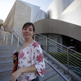 Woman Pauses at Walt Disney Concert Hall Steps