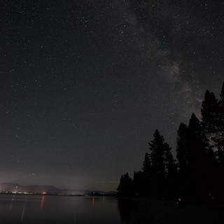 Milky Way Arches Over Serene Lake Tahoe Shore
