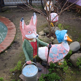 Whimsical Fox and Duck Garden Sculptures in Fantasyland