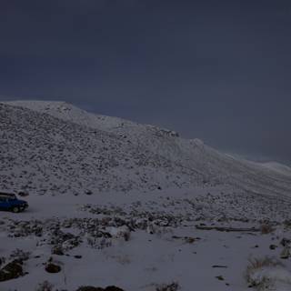 Blue Truck Braving the Winter Slope