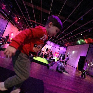 Child Dancing at Baby Rave Event