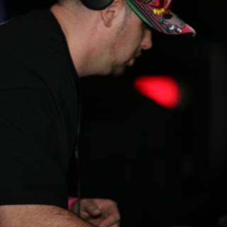 Funky DJ with Headphones and Hat