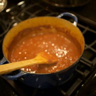 Simmering Tomato Sauce on the Stove
