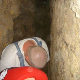Red-shirted man exploring the Dungeon