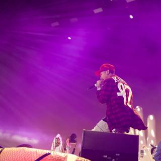 Tyga Rocks Coachella Stage in Plaid and Red Cap