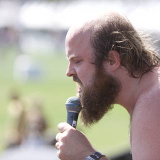 Bearded Singer with Powerful Mic at Coachella