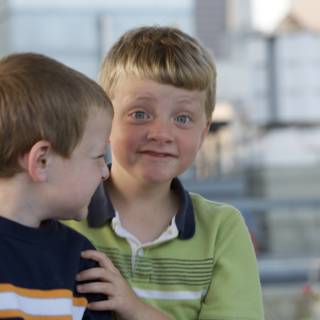 Two Boys Gazing at the Cityscape