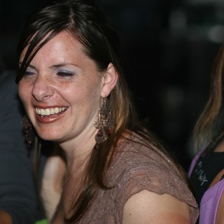 Joyful Woman Laughing at Nightclub Event 2006