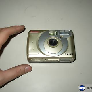 Vintage Digital Camera on the Table