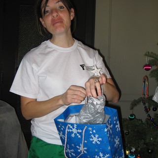 Disappointed Woman Opens Christmas Gift Bag