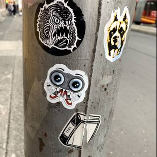 Sticker-Covered Pole on the Street