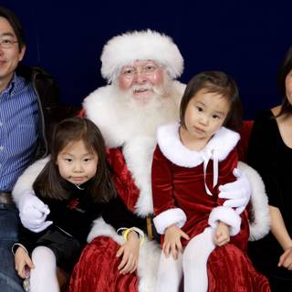 A Jolly Family with Santa Claus
