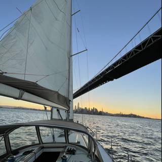 Sunset Sailboat Under the Golden Gate Bridge