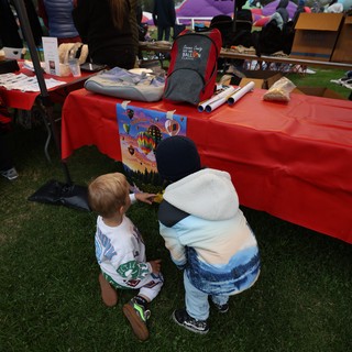 Young Children Explore Hot Air Balloon Festival Booth