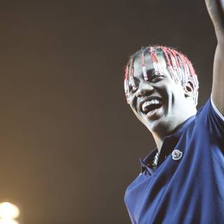 Lil Yachty Triumphantly Smiling on Stage