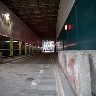 Industrial Loading Bay with Covered Platforms at Night