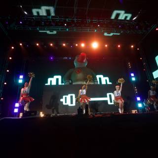 Group Performance on Stage with Large Screen