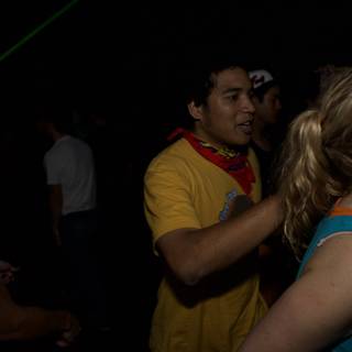 Nightclub Partygoers Enjoying the Beat as One Man Dances