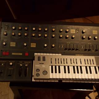 Electronic Synthesizer Keyboard and Mixer