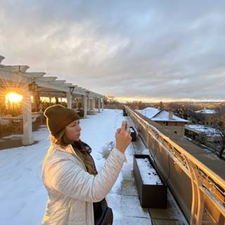 Capturing the Setting Sun over a Snowy Rooftop