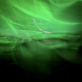 Abstract Light Trails in Green Neon Atmosphere