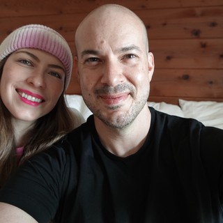 Cozy Couple's Selfie in Modern Bedroom