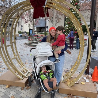 Family Holiday Photo at Festive Christmas Display