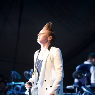 White Suited Singer Electrifies Crowd at Coachella