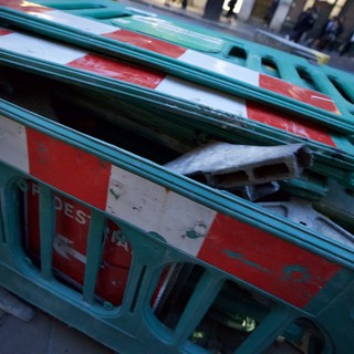 Construction Barriers Stacked at Urban Work Site