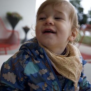 Joyful Toddler in Colorful Winter Jacket