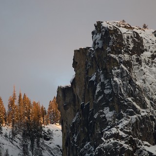 Snow-Dusted Rock Pinnacle at Winter Sunset