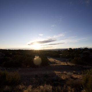 Golden Sunset Over Desert Wetlands and Scrubland